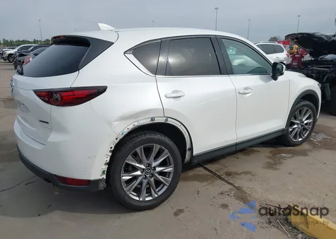 2021 Mazda Cx-5 Grand Touring z USA, uszkodzony, nr VIN JM3KFADMXM1339964